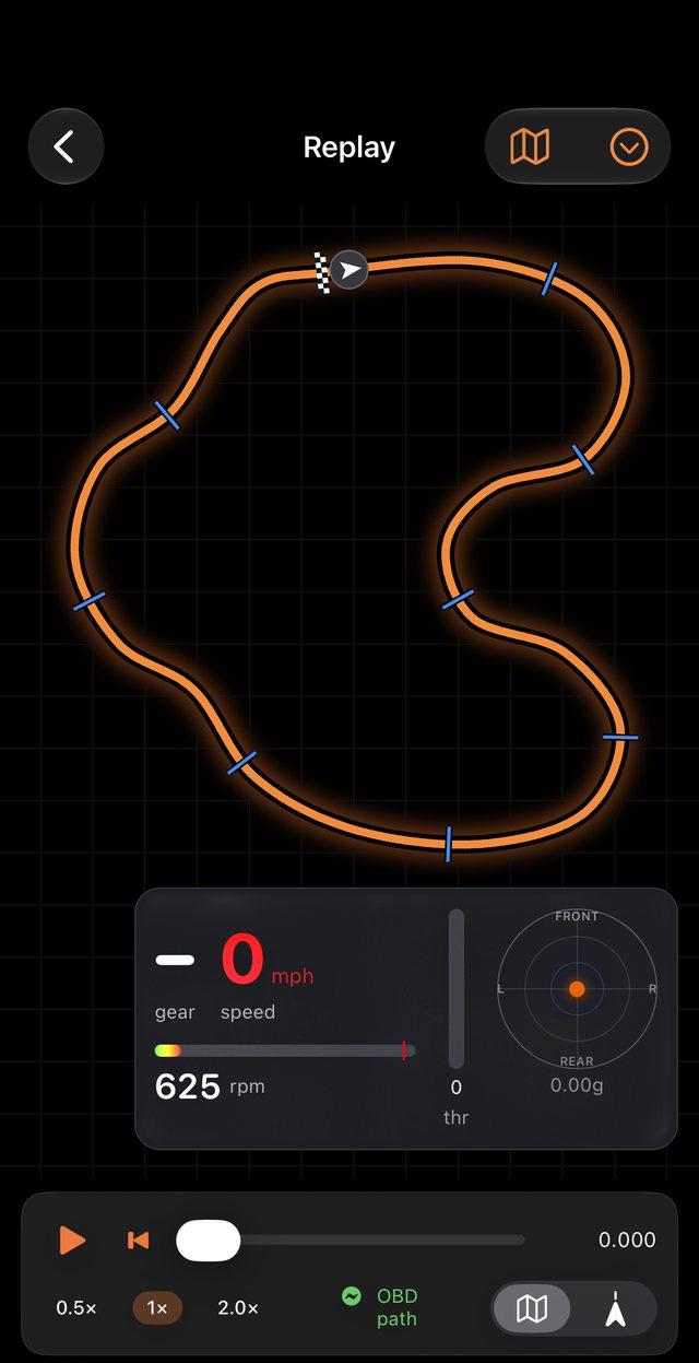 TrackDyno lap replay showing the track outline with start line and sector markers, plus live gear, speed, RPM, throttle and g-force